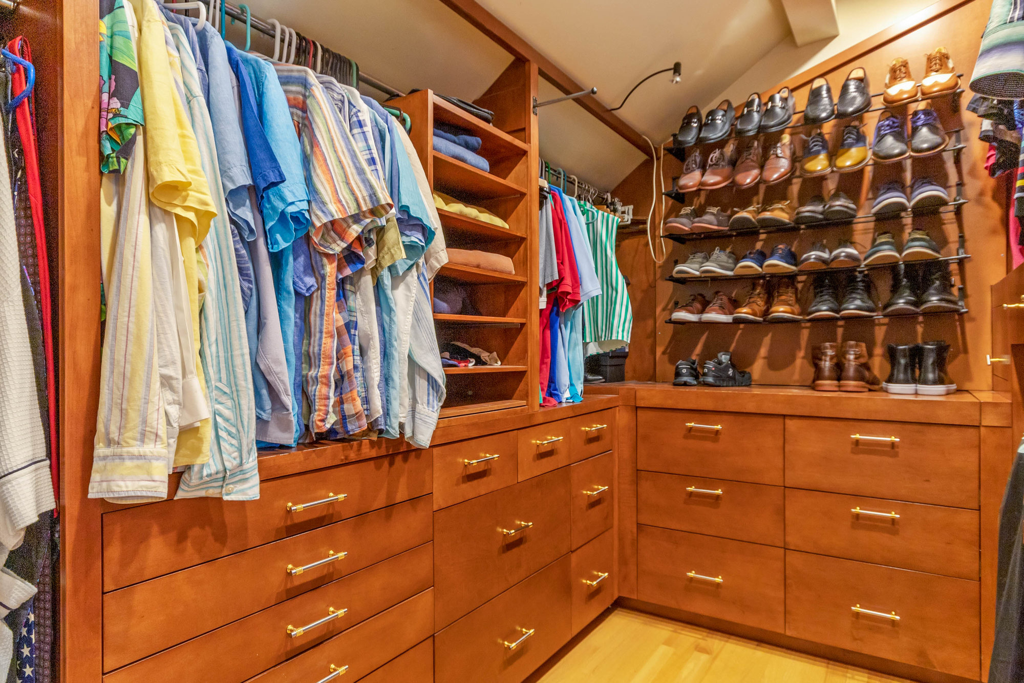 closet with brown built in storage